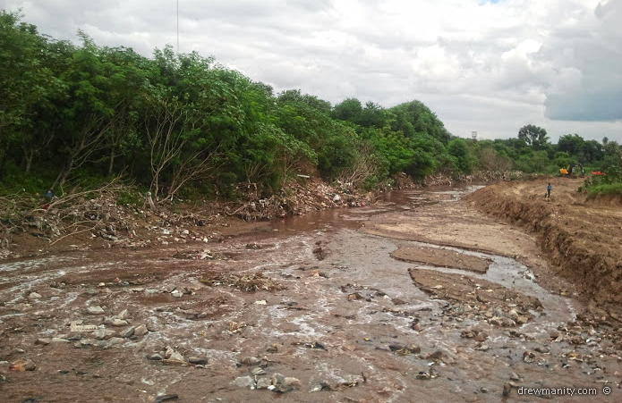 filthy city run off and waste filled river
